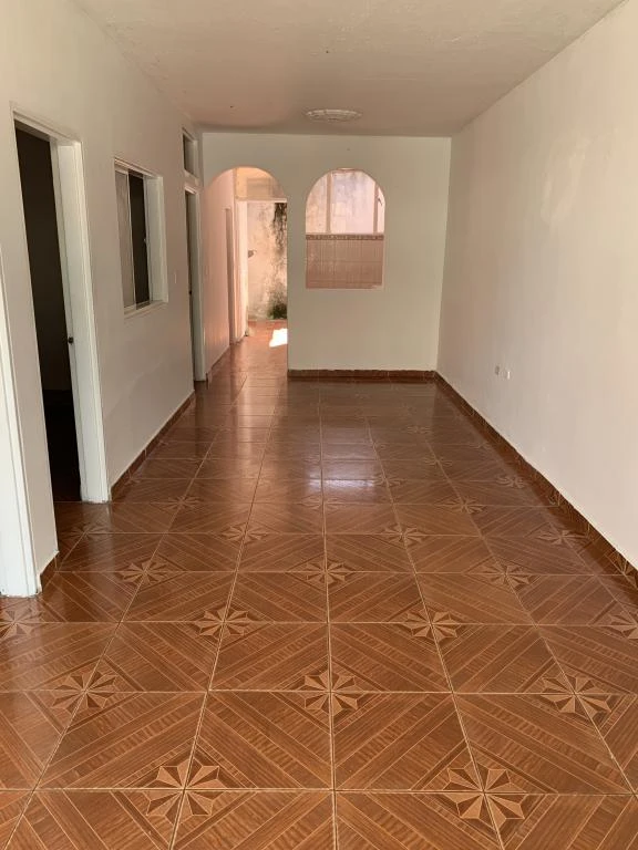 CARRERA 19 NO. 10-14 CASA BARRIO PORTAL DE LA CRUZ