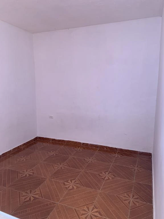 CARRERA 19 NO. 10-14 CASA BARRIO PORTAL DE LA CRUZ